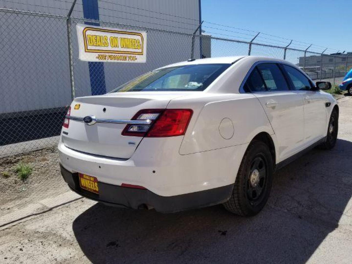 2015 Ford Taurus Police AWD (1FAHP2MKXFG) with an 3.7L V6 DOHC 24V engine, 6-Speed Automatic transmission, located at 1800 West Broadway, Missoula, 59808, (406) 543-1986, 46.881348, -114.023628 - Photo#4