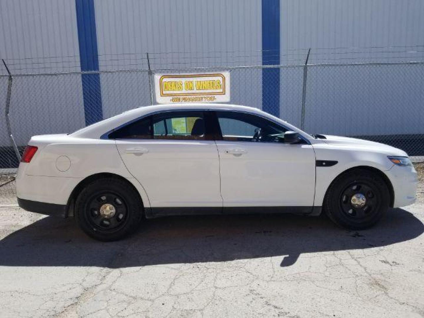 2015 Ford Taurus Police AWD (1FAHP2MKXFG) with an 3.7L V6 DOHC 24V engine, 6-Speed Automatic transmission, located at 1800 West Broadway, Missoula, 59808, (406) 543-1986, 46.881348, -114.023628 - Photo#5