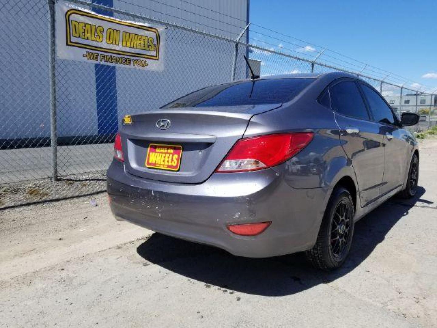 2015 Hyundai Accent GLS 4-Door 6A (KMHCT4AE3FU) with an 1.6L L4 DOHC 16V engine, 6-Speed Automatic transmission, located at 1821 N Montana Ave., Helena, MT, 59601, 0.000000, 0.000000 - Photo#4