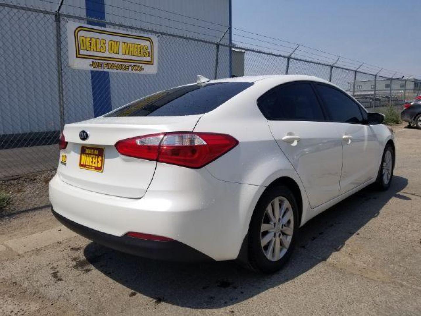 2015 Kia Forte EX (KNAFX4A69F5) with an 1.8L L4 DOHC 16V engine, 6-Speed Automatic transmission, located at 601 E. Idaho St., Kalispell, MT, 59901, 0.000000, 0.000000 - Photo#4