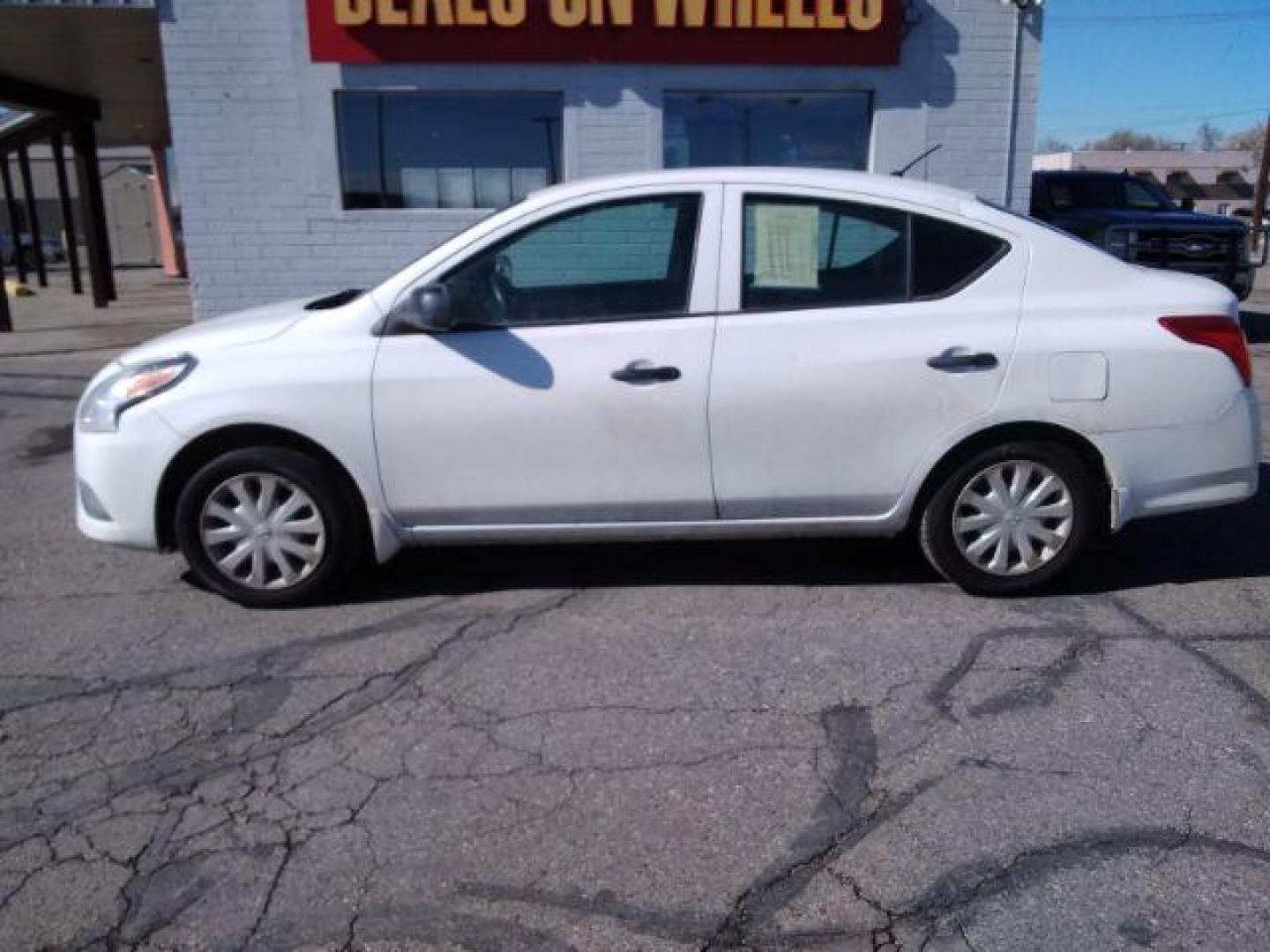 2015 Nissan Versa 1.6 S 5M (3N1CN7AP6FL) with an 1.6L L4 DOHC 16V engine, 5-Speed Manual transmission, located at 4047 Montana Ave., Billings, MT, 59101, 45.770847, -108.529800 - Photo#0