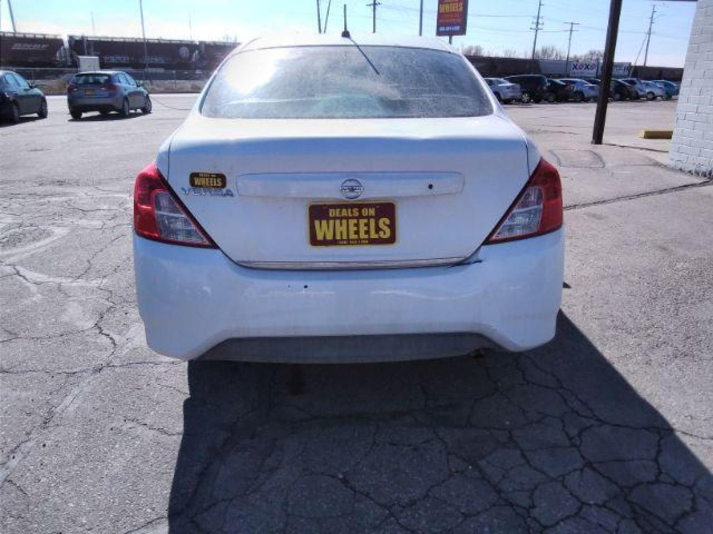 2015 Nissan Versa 1.6 S 5M (3N1CN7AP6FL) with an 1.6L L4 DOHC 16V engine, 5-Speed Manual transmission, located at 4047 Montana Ave., Billings, MT, 59101, 45.770847, -108.529800 - Photo#6